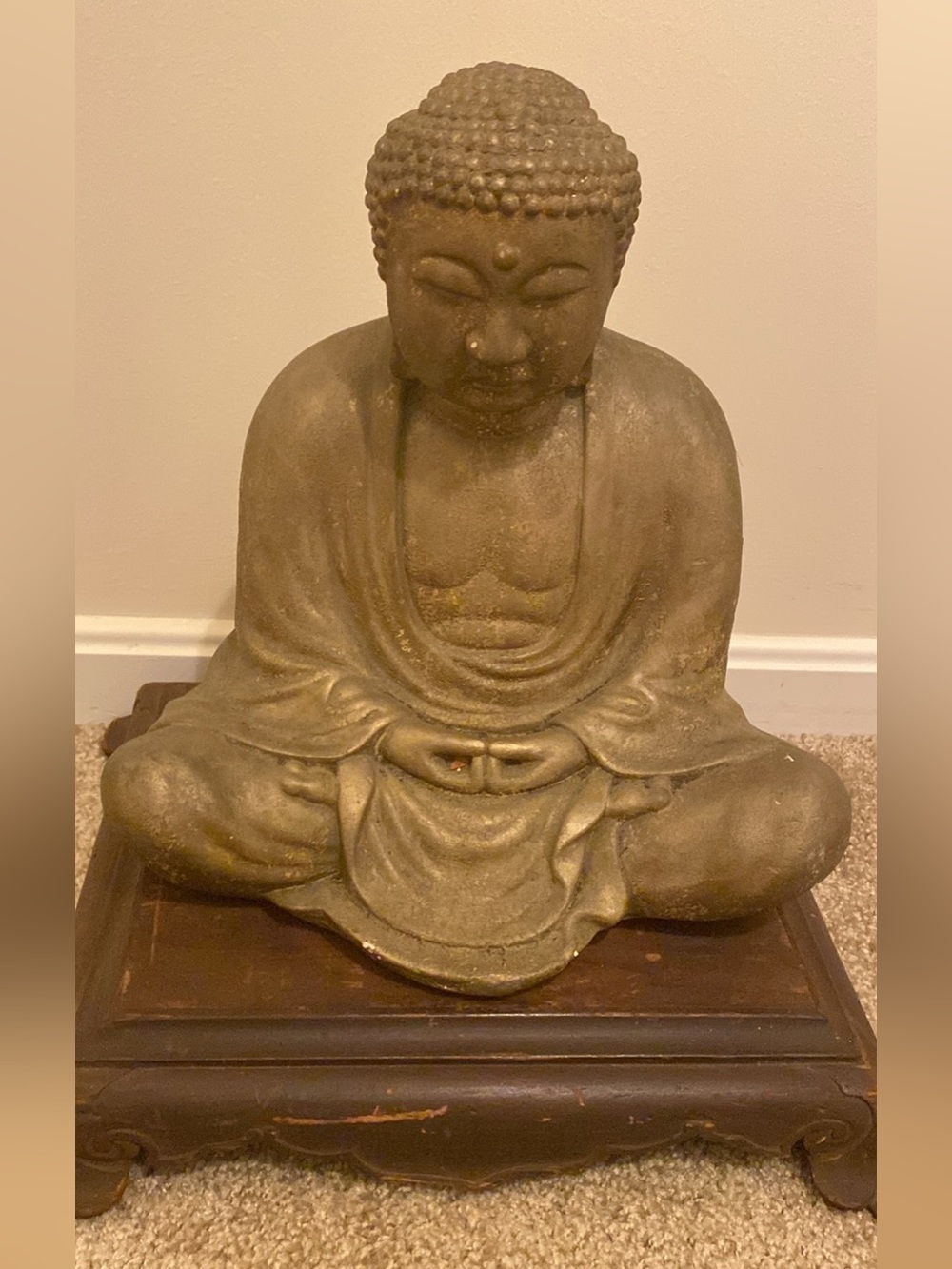 Meditating Buddha Statue in Aged Gold Tone with wooden Pedestal.